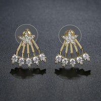 Close up of KHAISTA crystal pentagram stud earrings