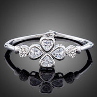 KHAISTA crystal petal bangle bracelet on white background