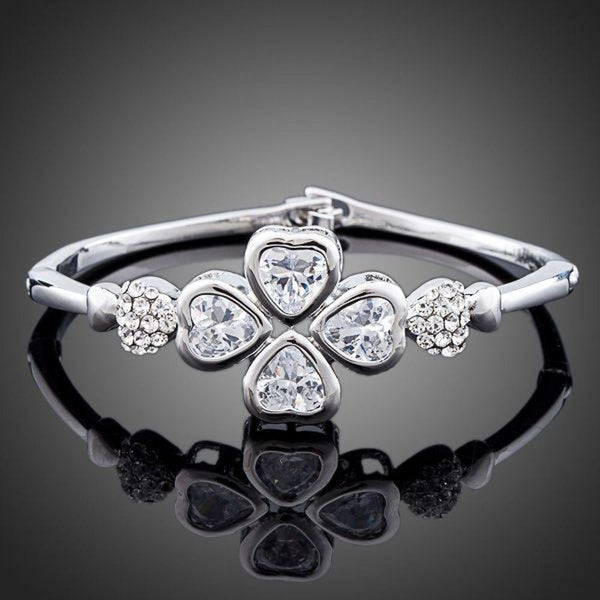 KHAISTA crystal petal bangle bracelet on white background