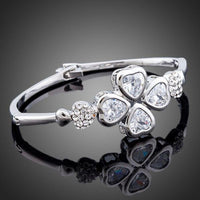 Close up detail of KHAISTA crystal petal bangle bracelet