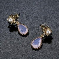 pink opal crystal drop earrings detail view by KHAISTA