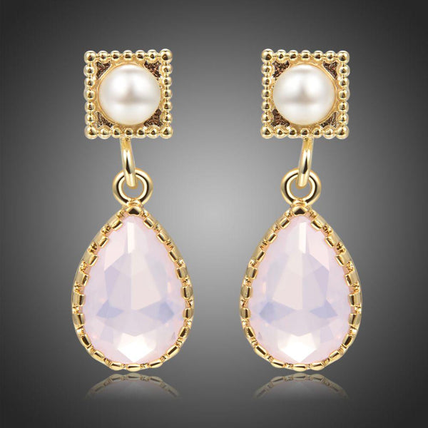 KHAISTA pink opal crystal drop earrings on white background