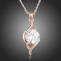 KHAISTA plant shape CZ pendant necklace on white background