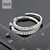 platinum plated bangle design drop earrings detail view by KHAISTA