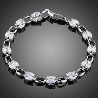 KHAISTA platinum crystal toggle bracelet on white background