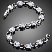 Close up detail of KHAISTA platinum crystal toggle bracelet