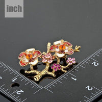 Plum blossom branch design on Khaista brooch