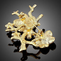 Close-up of blossom detail on Khaista branch brooch