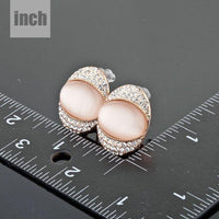 crystal popping eye stud earrings detail view by KHAISTA