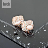 popping eyes emoji crystal stud earrings detail view by KHAISTA