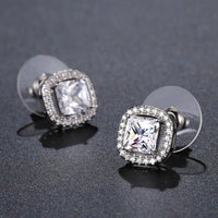 prong set square crystal stud earrings detail view by KHAISTA