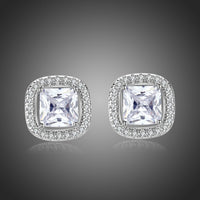 KHAISTA prong set square crystal stud earrings on white background