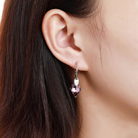 purple Austrian crystal drop earrings detail view by KHAISTA