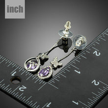 Load image into Gallery viewer, Purple Butterfly Zirconia Drop Earrings - KHAISTA Fashion Jewellery
