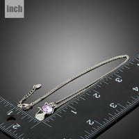 Pendant detail on KHAISTA purple crystal cat pendant necklace