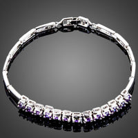 KHAISTA purple crystal charm cuff bracelet on white background