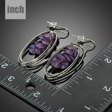 Load image into Gallery viewer, Purple Crystal Dangle Drop Earrings - KHAISTA Fashion Jewellery
