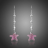 KHAISTA purple crystal star drop earrings on white background