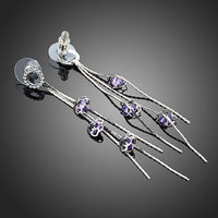 purple CZ drop earrings detail view by KHAISTA