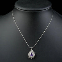 Close up detail of KHAISTA purple CZ pendant necklace