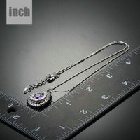 Pendant detail on KHAISTA purple CZ pendant necklace