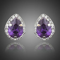 KHAISTA purple CZ pear shaped stud earrings on white background