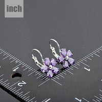 purple daisy crystal stud earrings detail view by KHAISTA