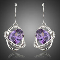KHAISTA purple halo crystal drop earrings on white background