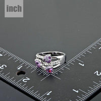 Heart shaped detail on KHAISTA purple crystal ring