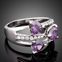 Close up of purple Stellux crystals on KHAISTA heart ring