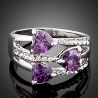KHAISTA purple heart crystal ring on white background