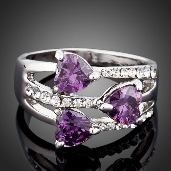 KHAISTA purple heart crystal ring on white background