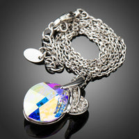 Side angle view of KHAISTA purple leaf drop crystal necklace