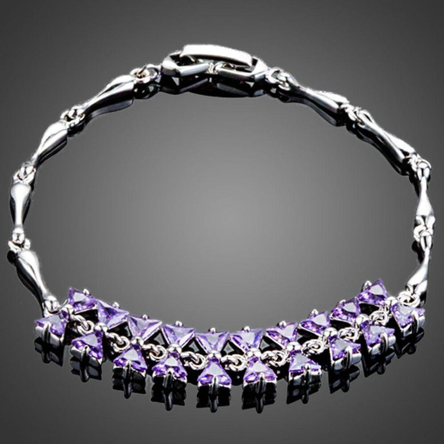 KHAISTA purple crystal bow knot bracelet on white background