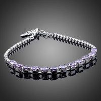 KHAISTA purple CZ link chain bracelet on white background