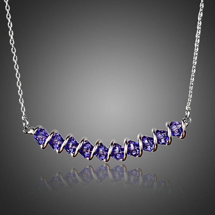 KHAISTA purple crystal link chain pendant necklace on white background