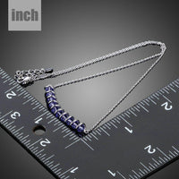 Pendant detail on KHAISTA purple crystal link chain pendant necklace