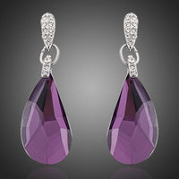 KHAISTA purple raindrop crystal drop earrings on white background