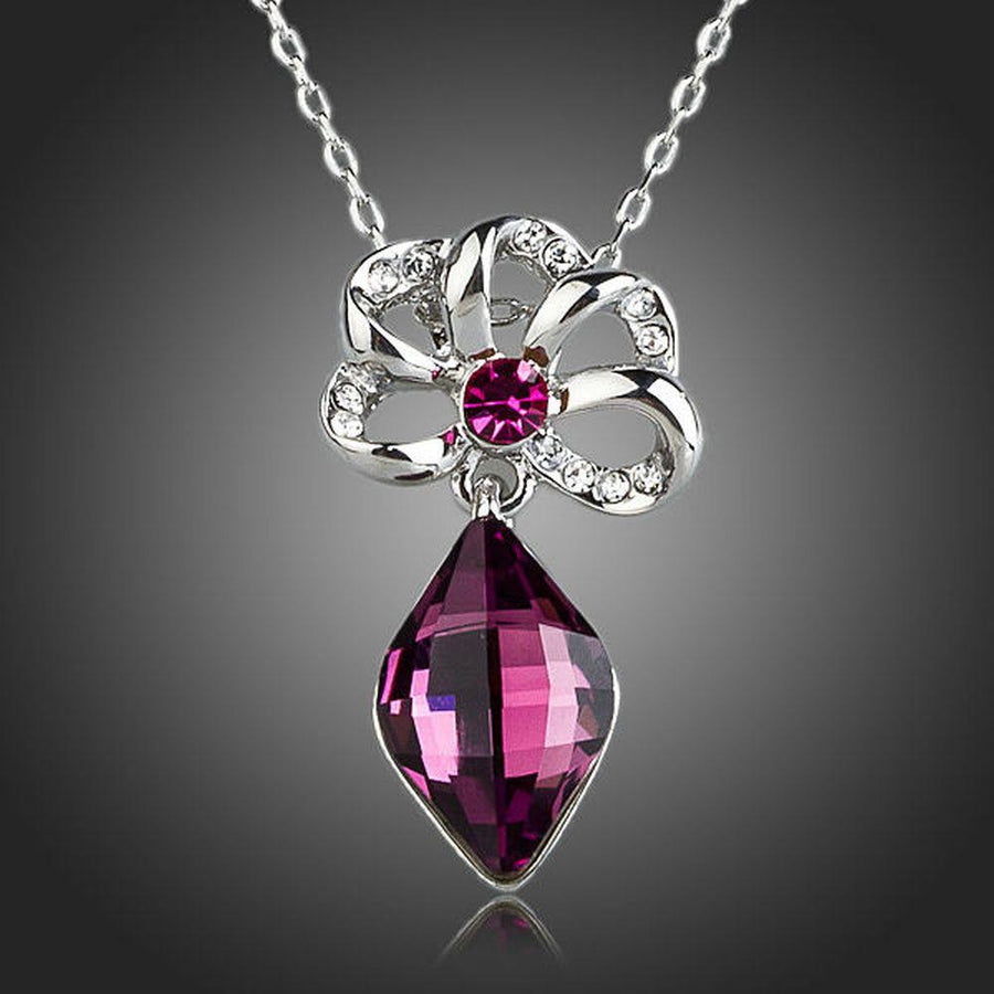 KHAISTA purple Stellux Austrian crystal necklace on white background
