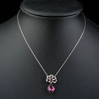 Close up detail of KHAISTA purple Stellux Austrian crystal necklace