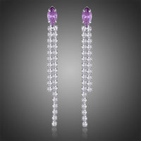 KHAISTA purple crystal tassel dangle earrings on white background