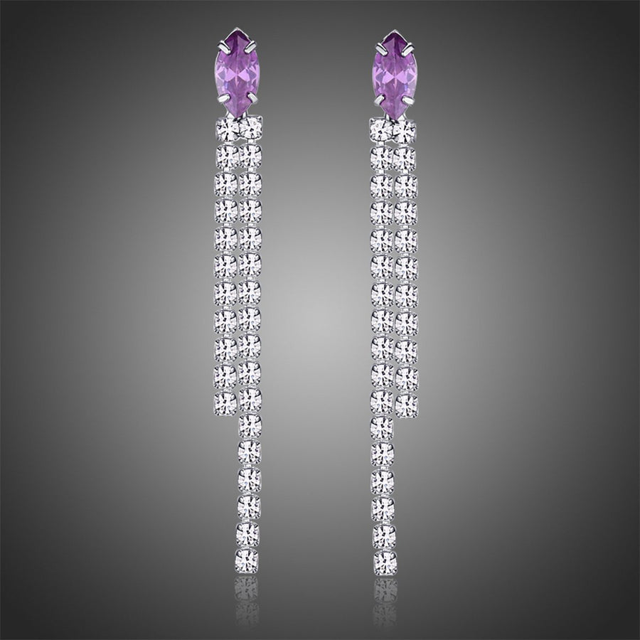 KHAISTA purple crystal tassel dangle earrings on white background