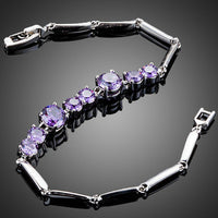 Close up detail of KHAISTA purple CZ toggle clasp bracelet