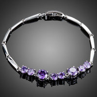 KHAISTA purple CZ toggle clasp bracelet on white background