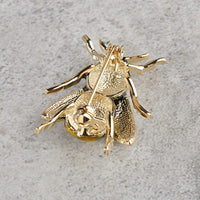 Bee detail view of Khaista honey bee brooch pin