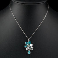 Pendant detail on KHAISTA raindrop daisy crystal pendant necklace