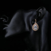 raindrop CZ drop earrings detail view by KHAISTA