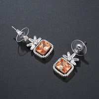 rectangle cut champagne drop earrings detail view by KHAISTA