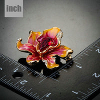 Red oil paint flower detail on Khaista brooch