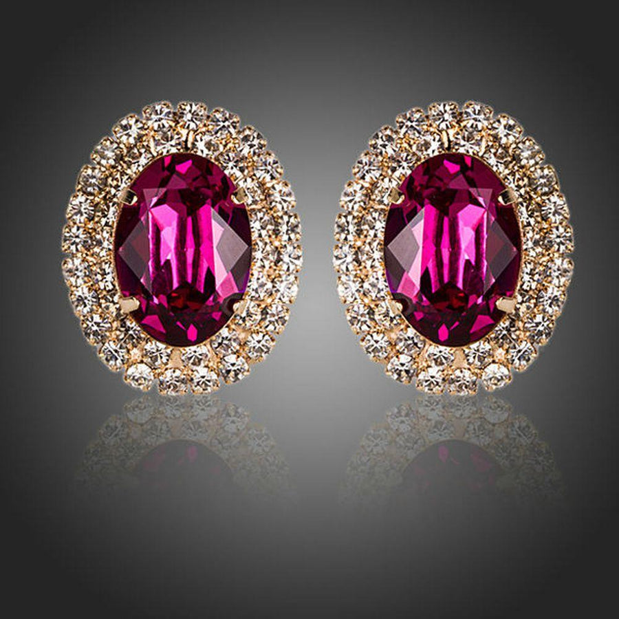 KHAISTA red CZ diamante oval stud earrings on white background